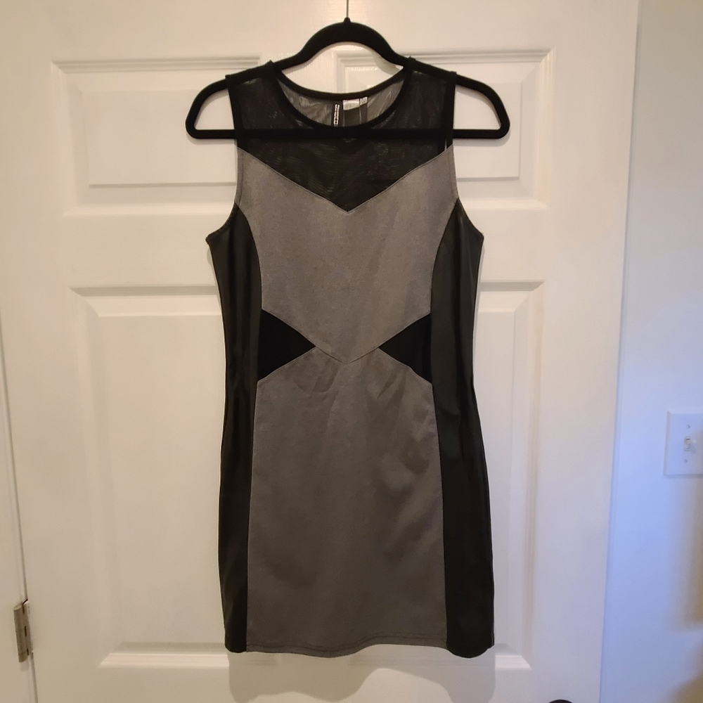 Form Fitting with lace peak-a-boo cutouts Dress
